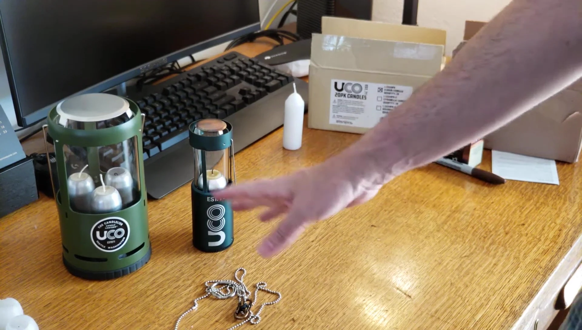 The reviewer discussing the preferred light quality of candle lanterns.