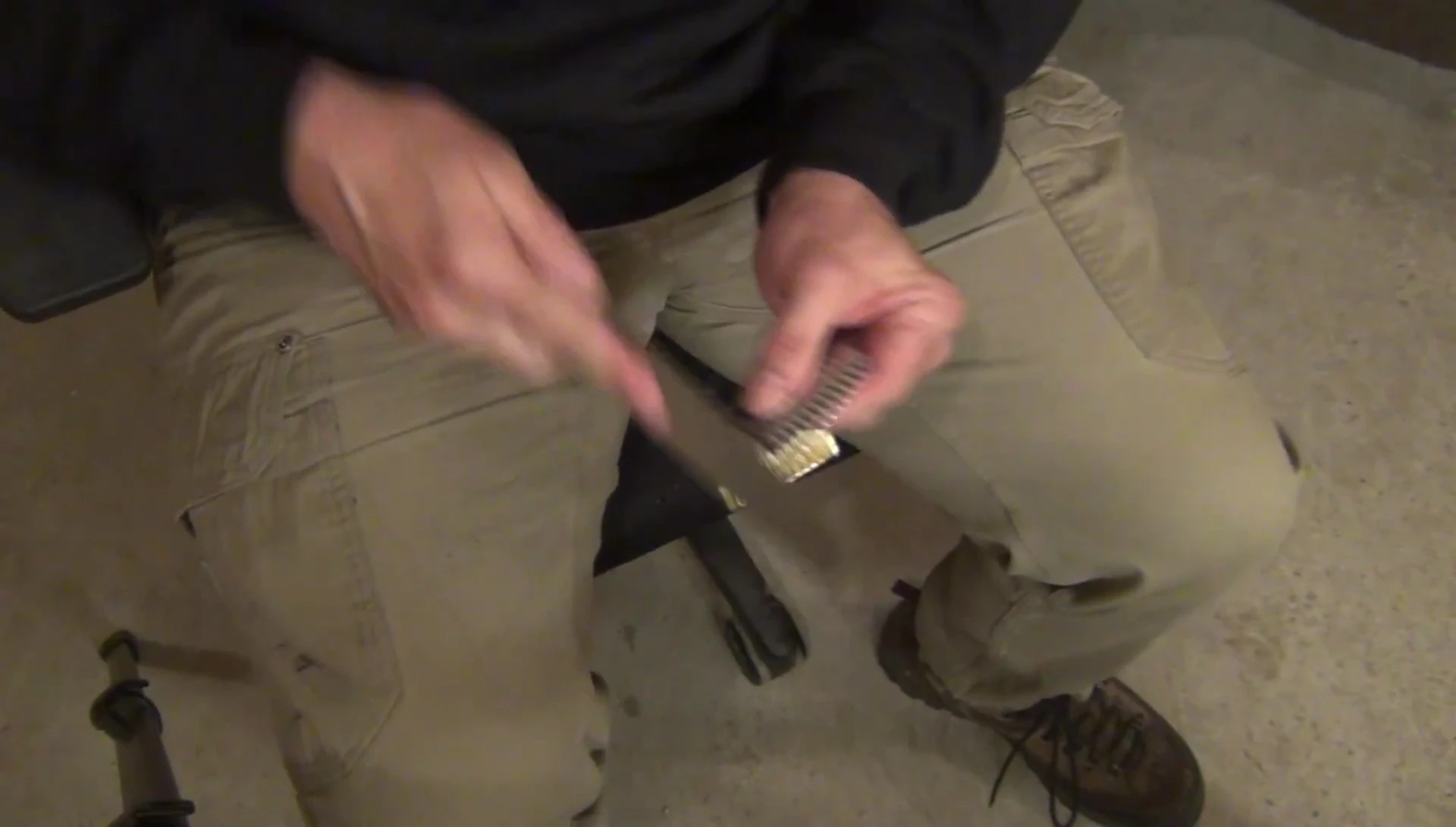 Filing and smoothing the edges of the top piece.