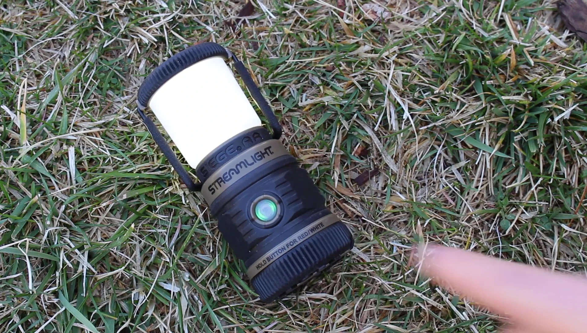The lantern's green power indicator is highlighted.