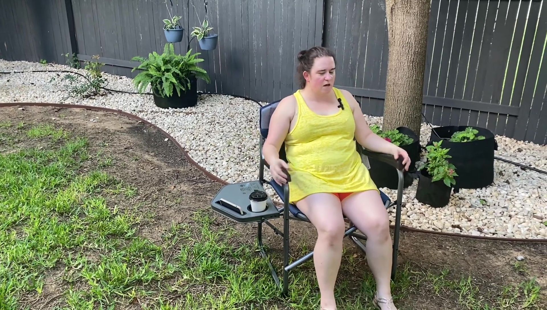Jordan sitting in the chair indoors, illustrating the initial height concern.