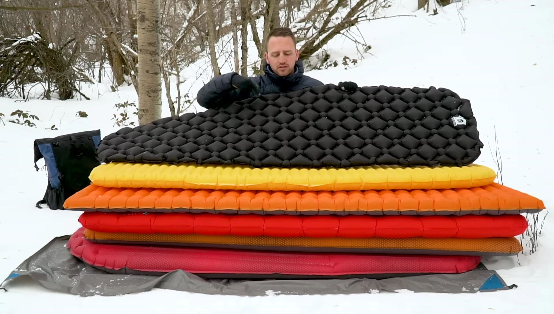 Sleeping pad with quilted baffle system