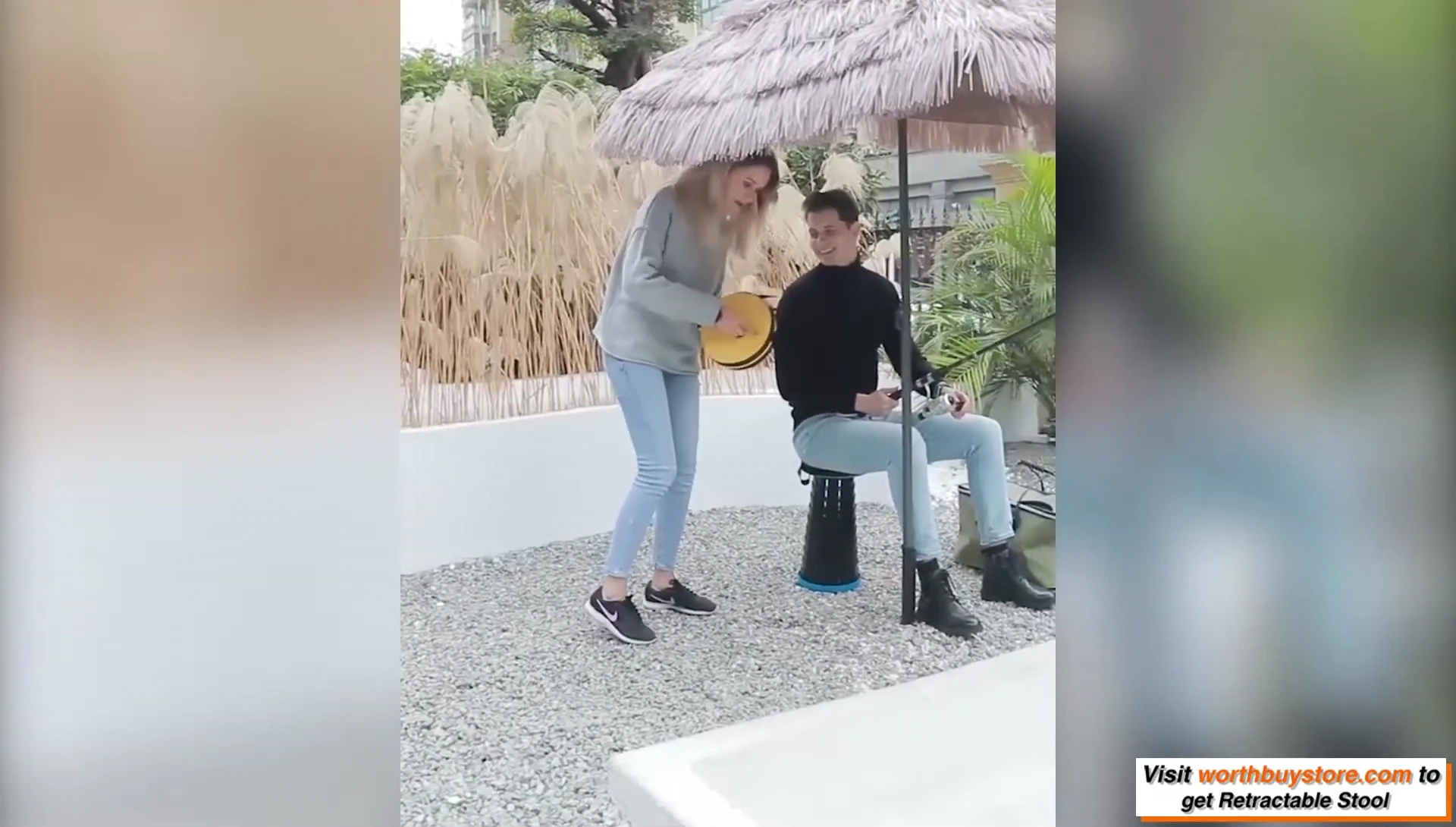Demonstration of the stool's lightweight nature.