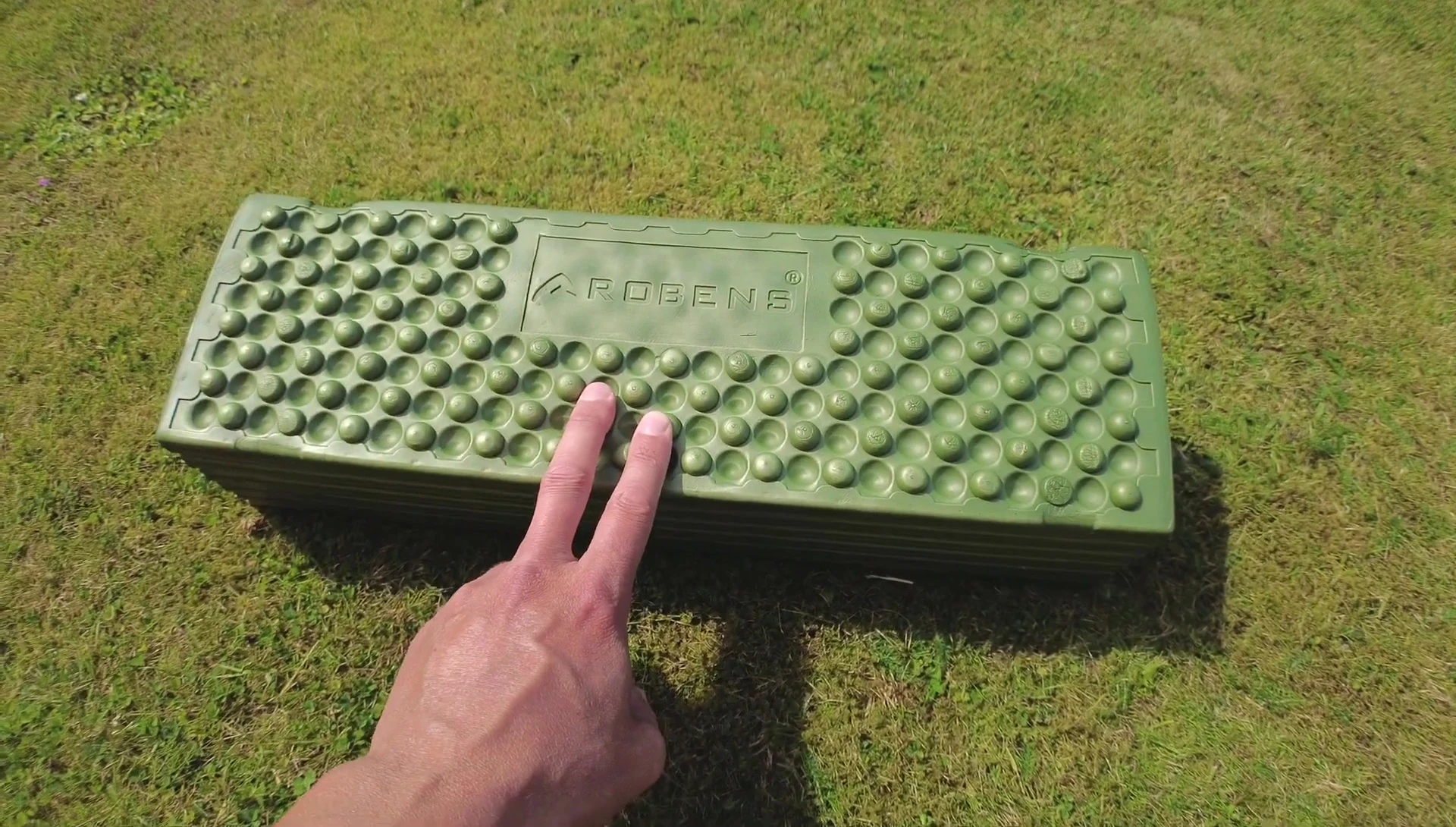 The reviewer holding the Robens ZigZag Slumber.