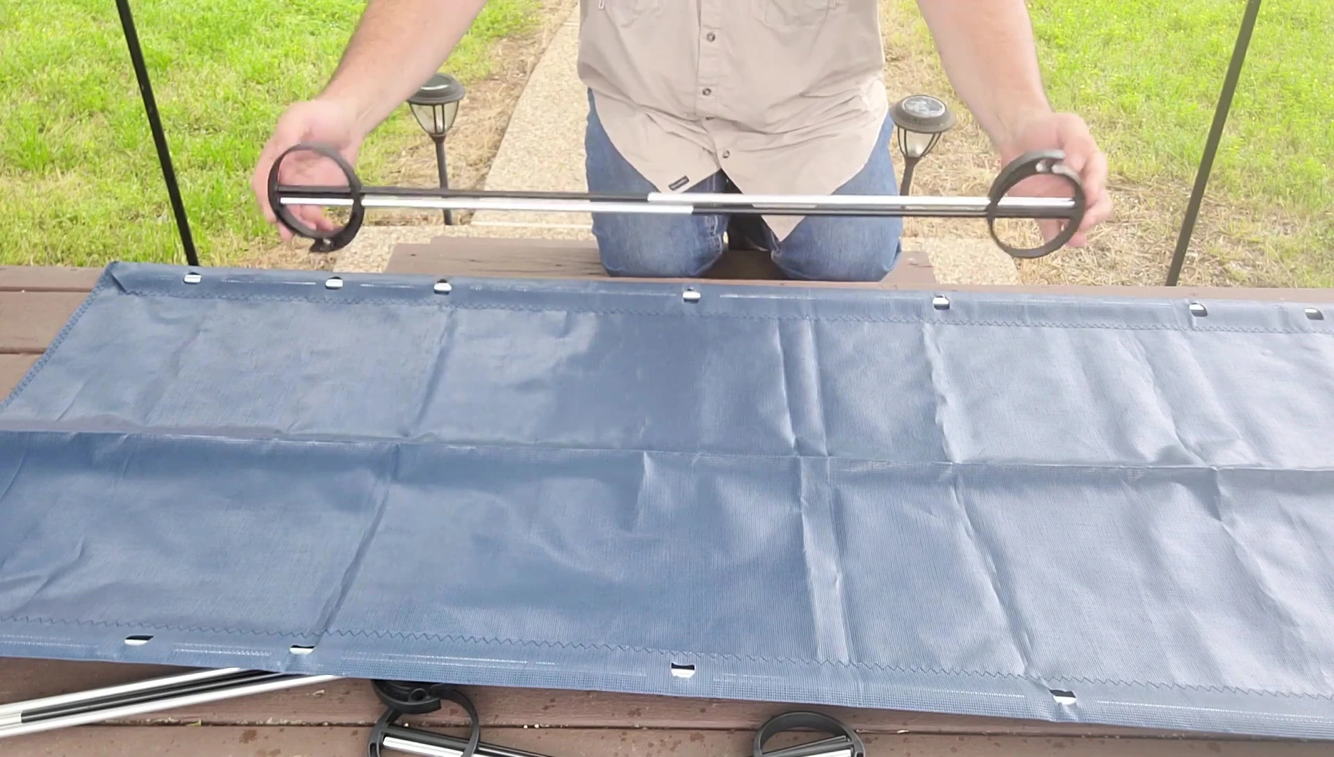 The narrator demonstrating the assembly process