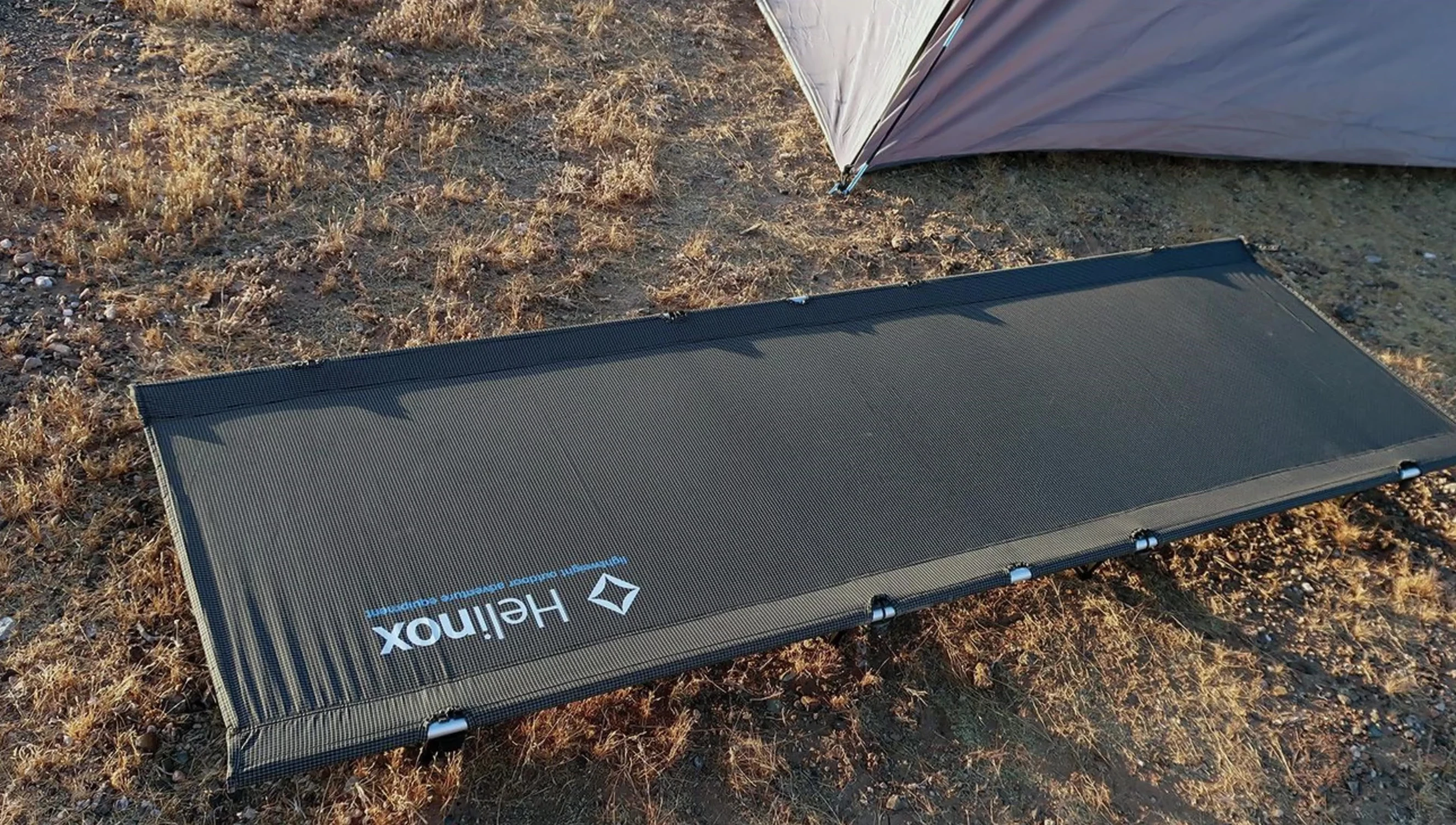 The Helox Light Cot shown folded and packed.