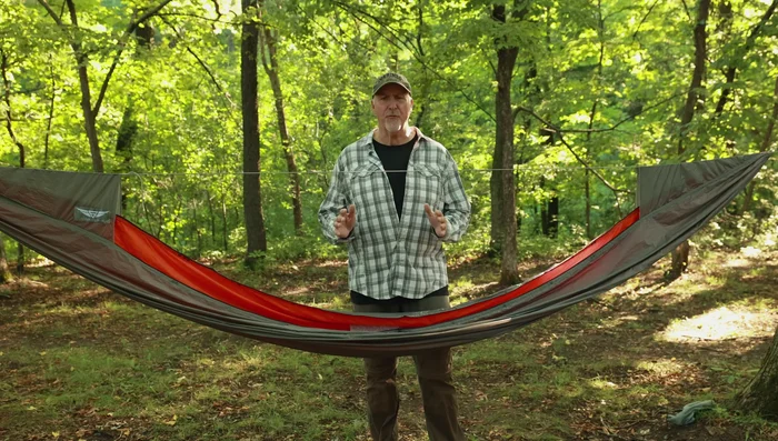 Place your closed-cell foam pad or inflatable sleeping pad asymmetrically diagonally in your hammock.