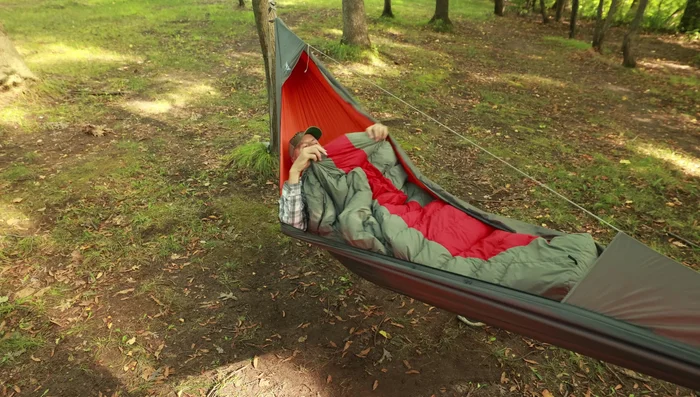 Slide your feet into the foot box and drape the rest of the sleeping bag over you.
