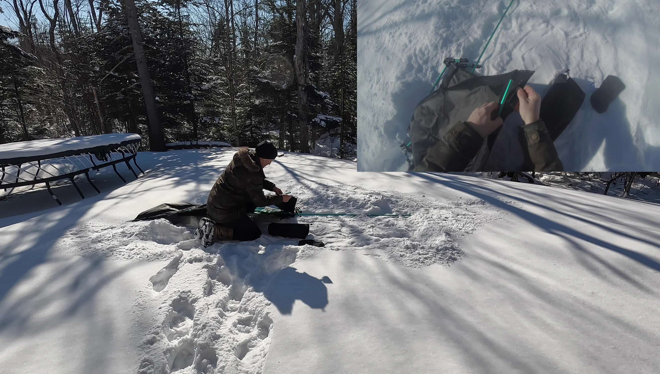 The reviewer working on getting a pole into place.