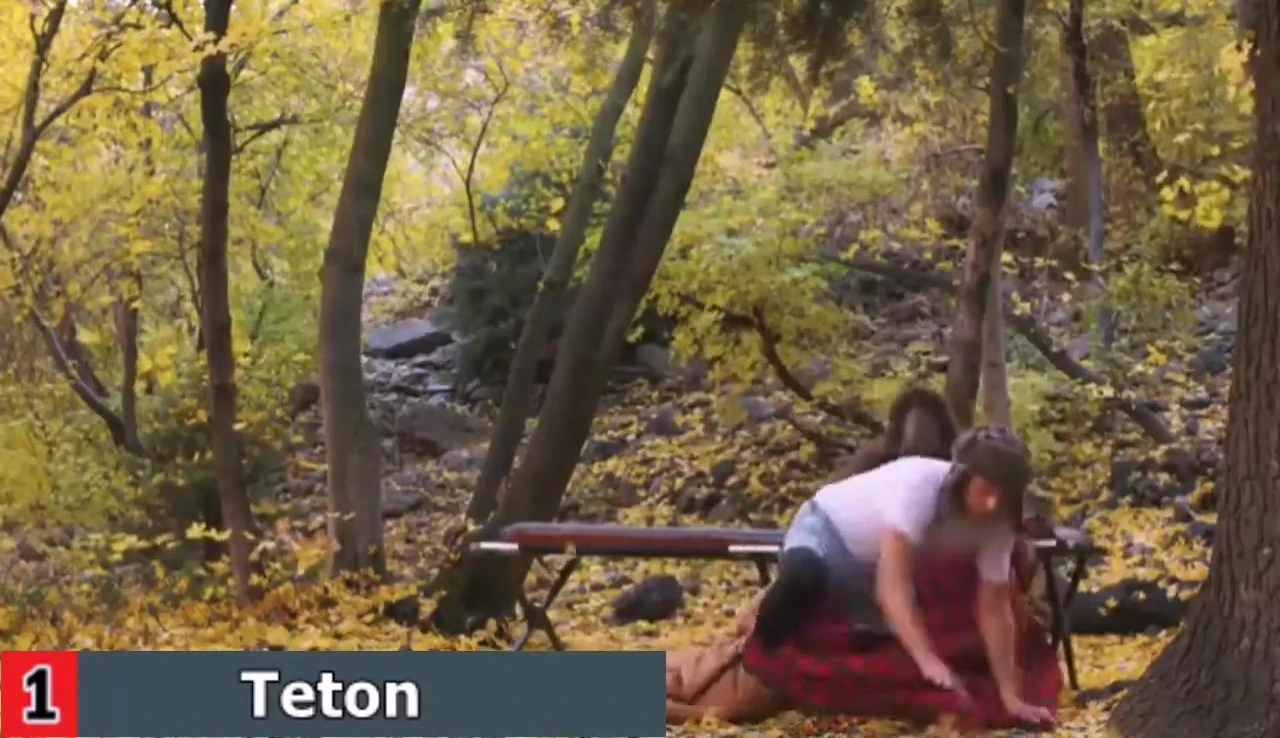 Person relaxing on the Teton Sports Outfitter Double XL Camping Cot