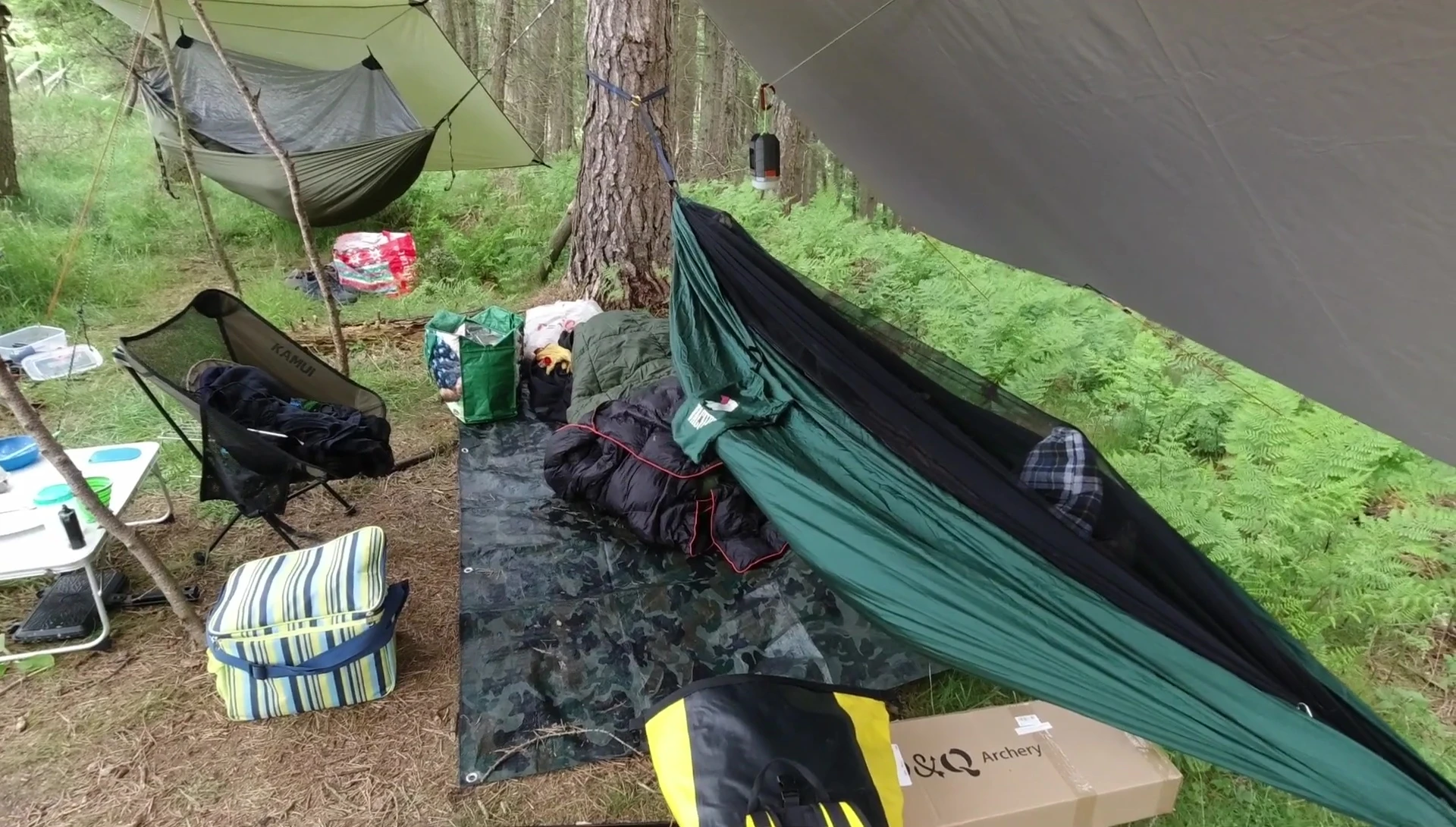 The reviewer showing the UniGear hammock.