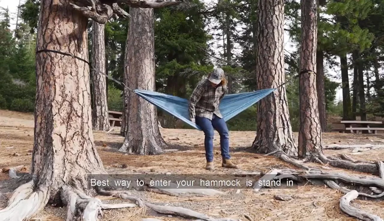 Demonstrating the proper way to enter the hammock.