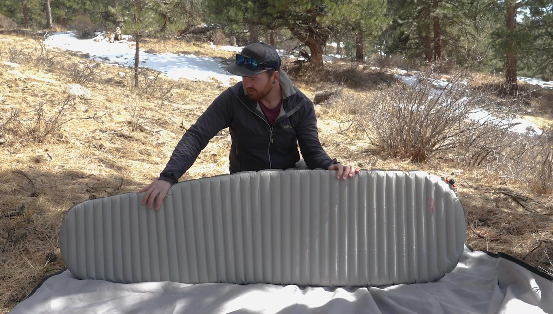 The reviewer emphasizing the pad's warmth.