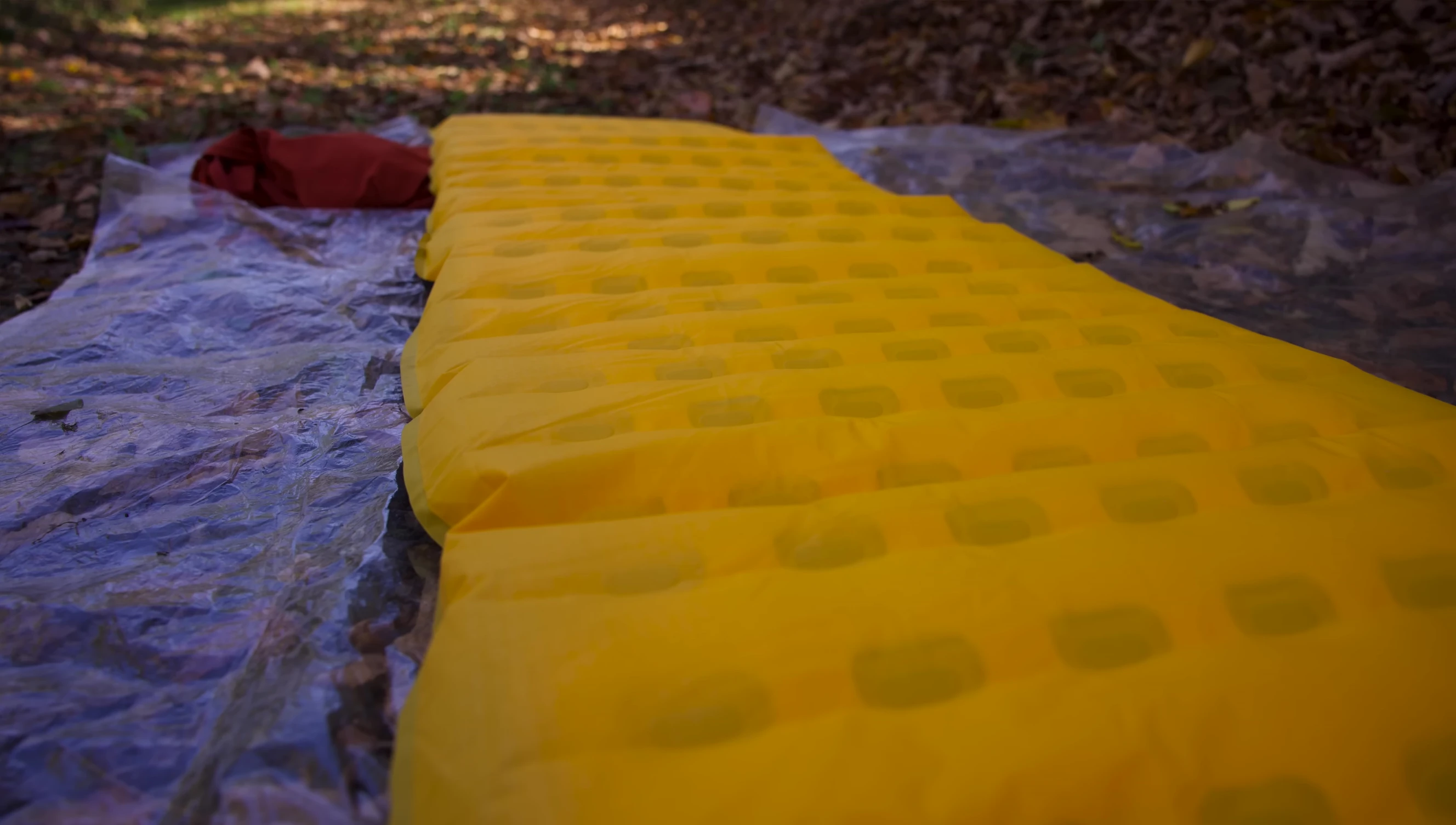 Close-up of the pad's materials showing the 20 denier polyester and PU coating.