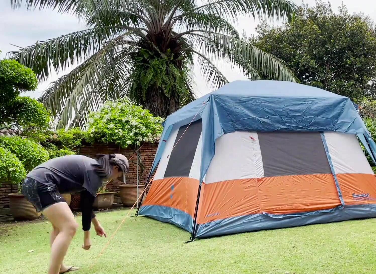 The tent being taken down