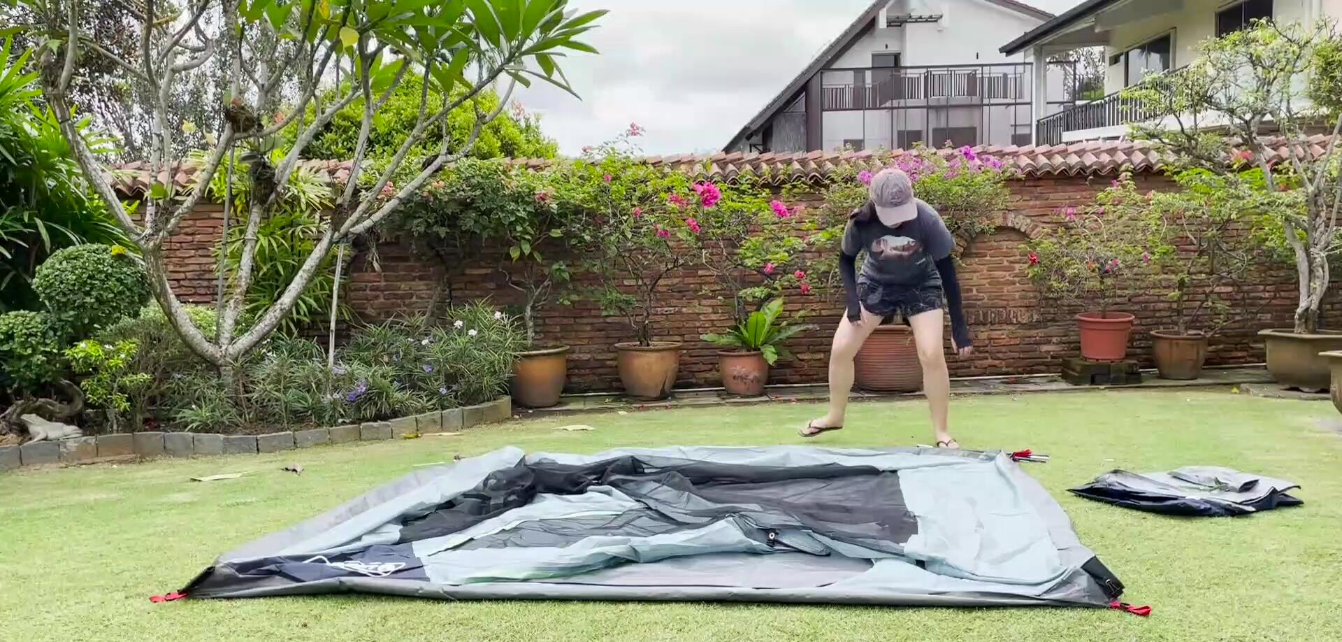 Laying out the tent body on the ground