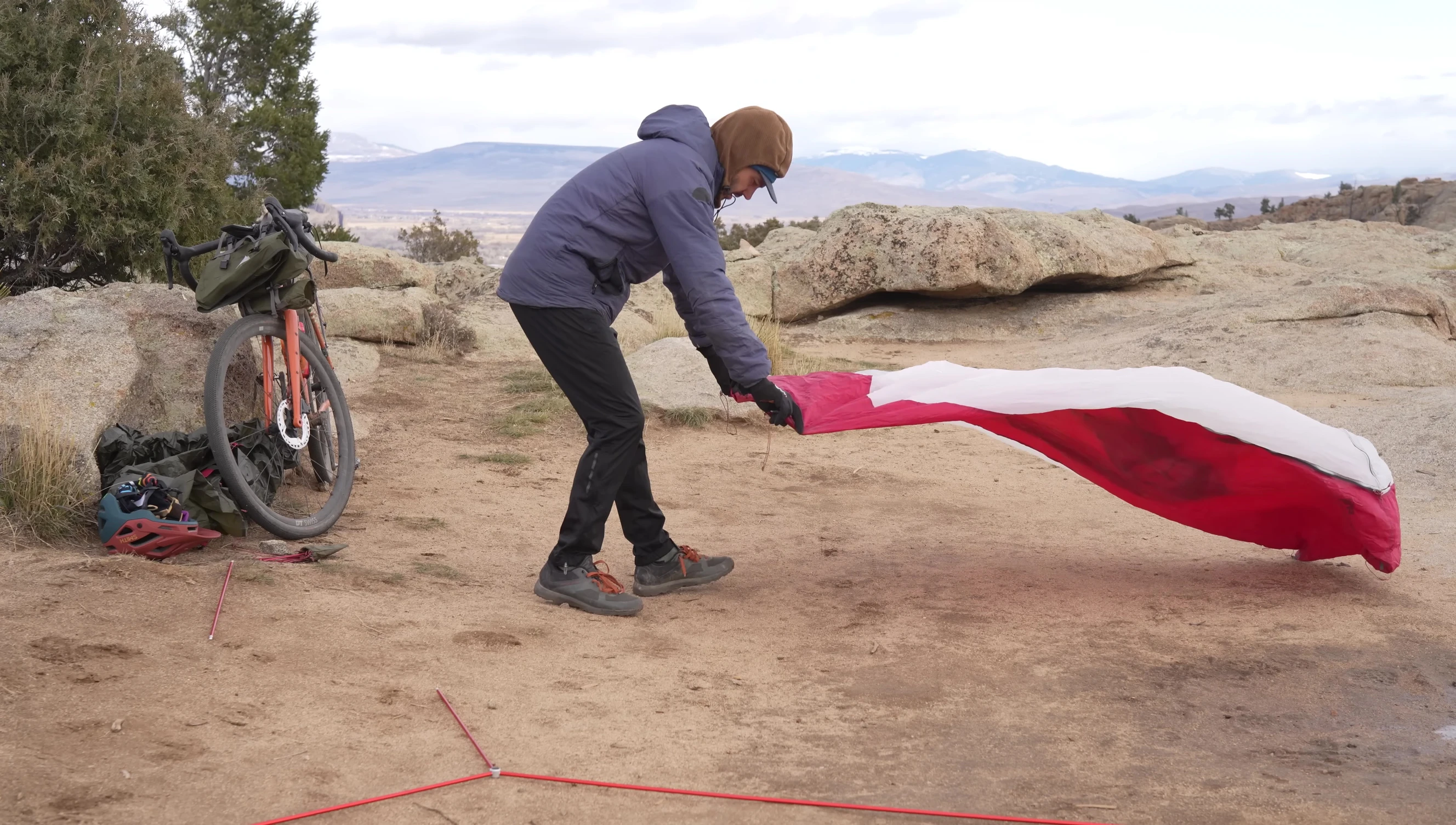 The reviewer setting up the tent.