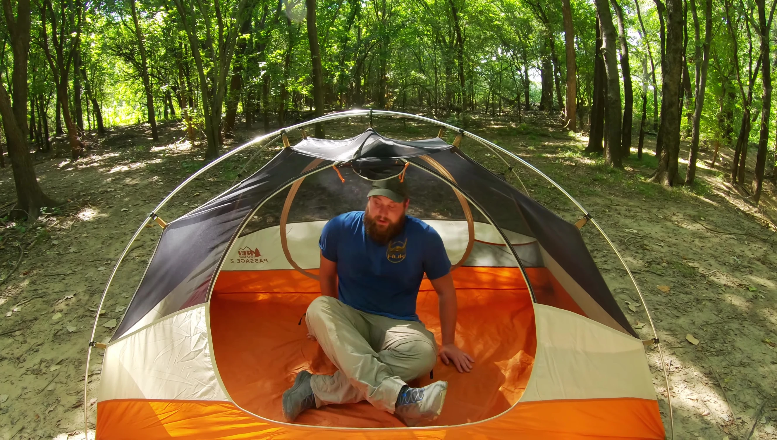 The reviewer lying down inside the tent to show space.