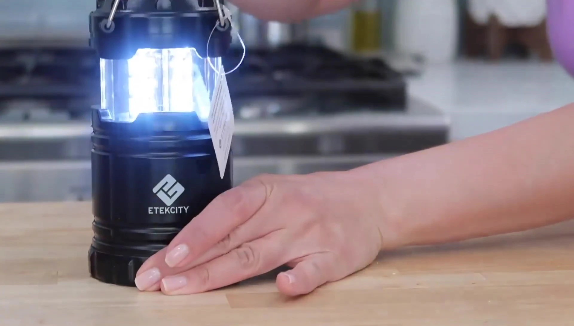 Illustrating the E-Tec City lantern's compact size.