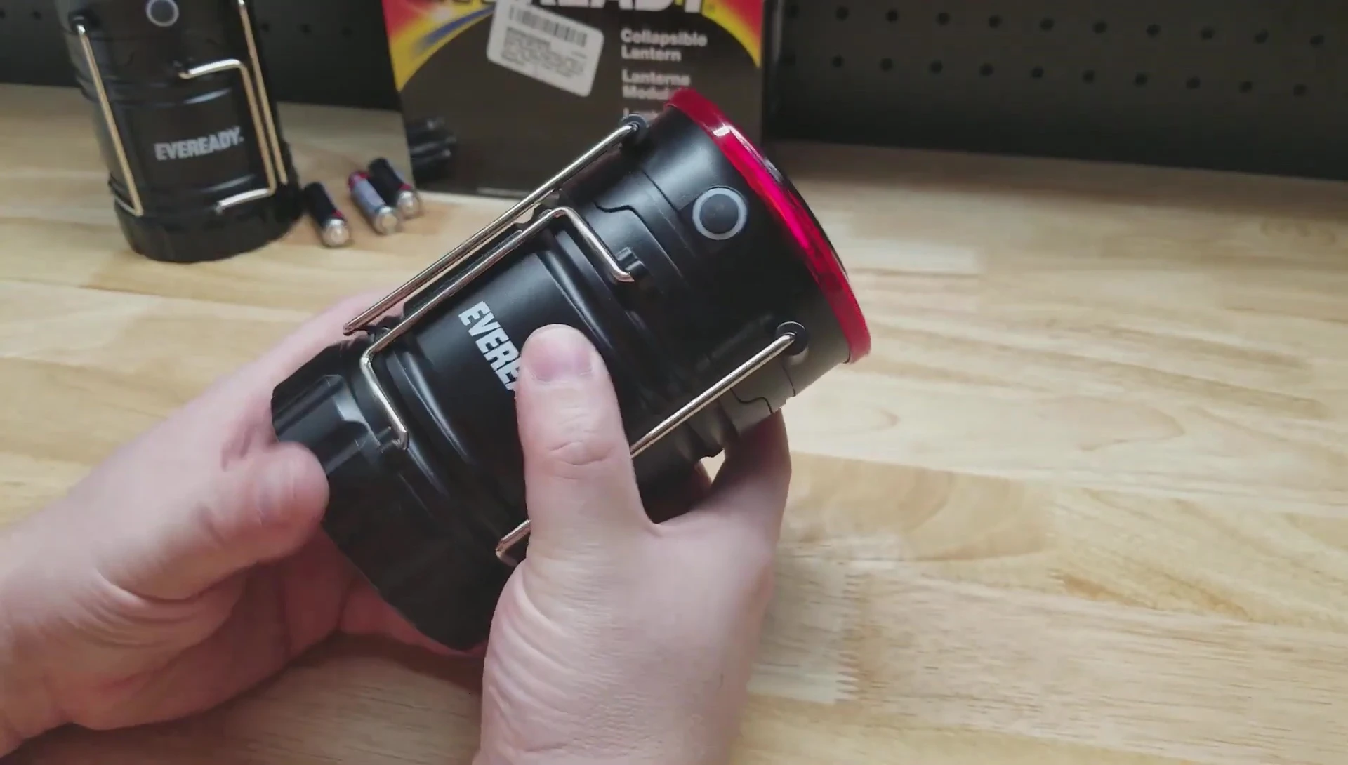 Demonstrating the Ever Ready lantern's brightness.