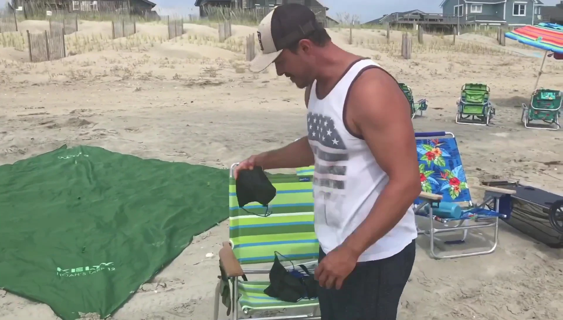 Securing sand anchors using carabiners