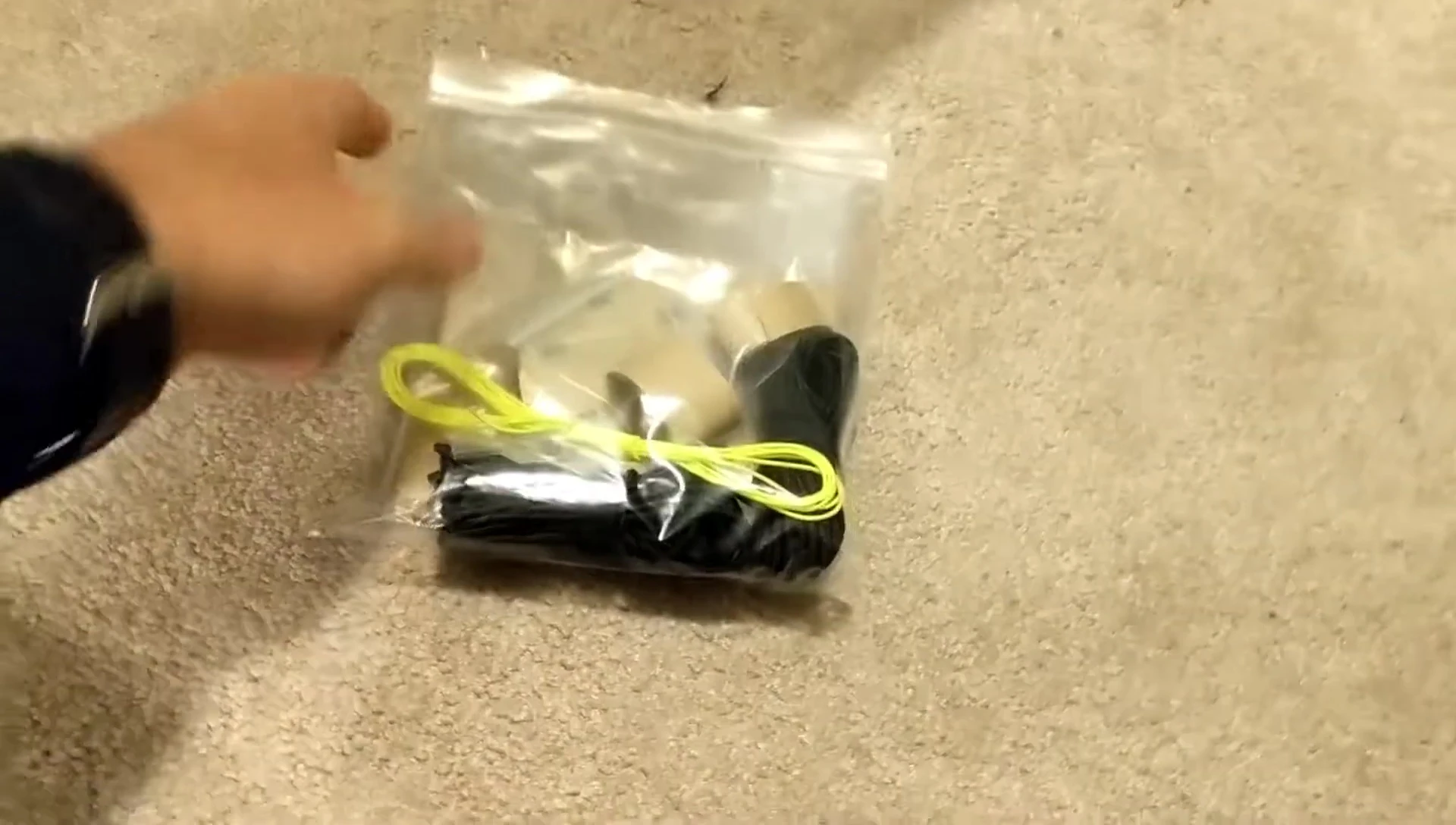 Showcasing the additional materials included with the ZPacks Pocket Tarp.