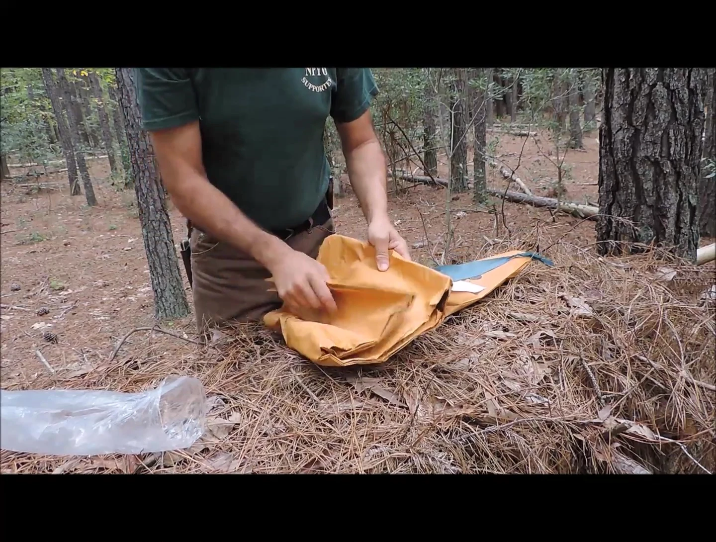 Detailed shot of the tarp material, showing stitching and webbing.