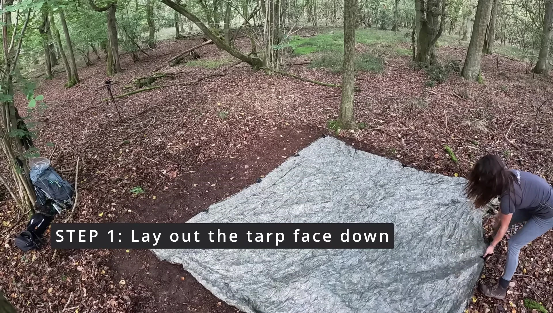 Laying out the tarp in a square