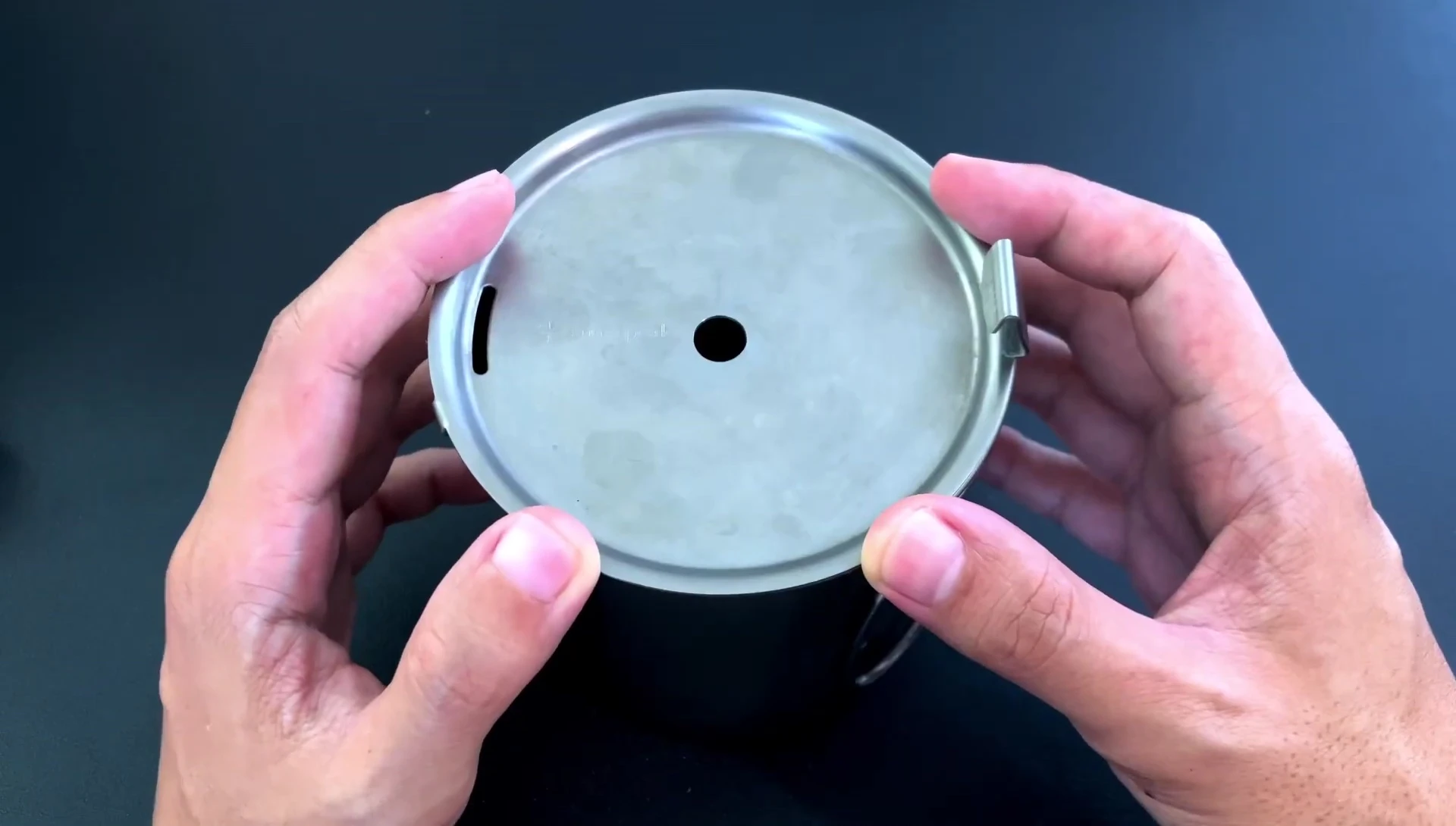 The modified mug with a hole added for the French press plunger.