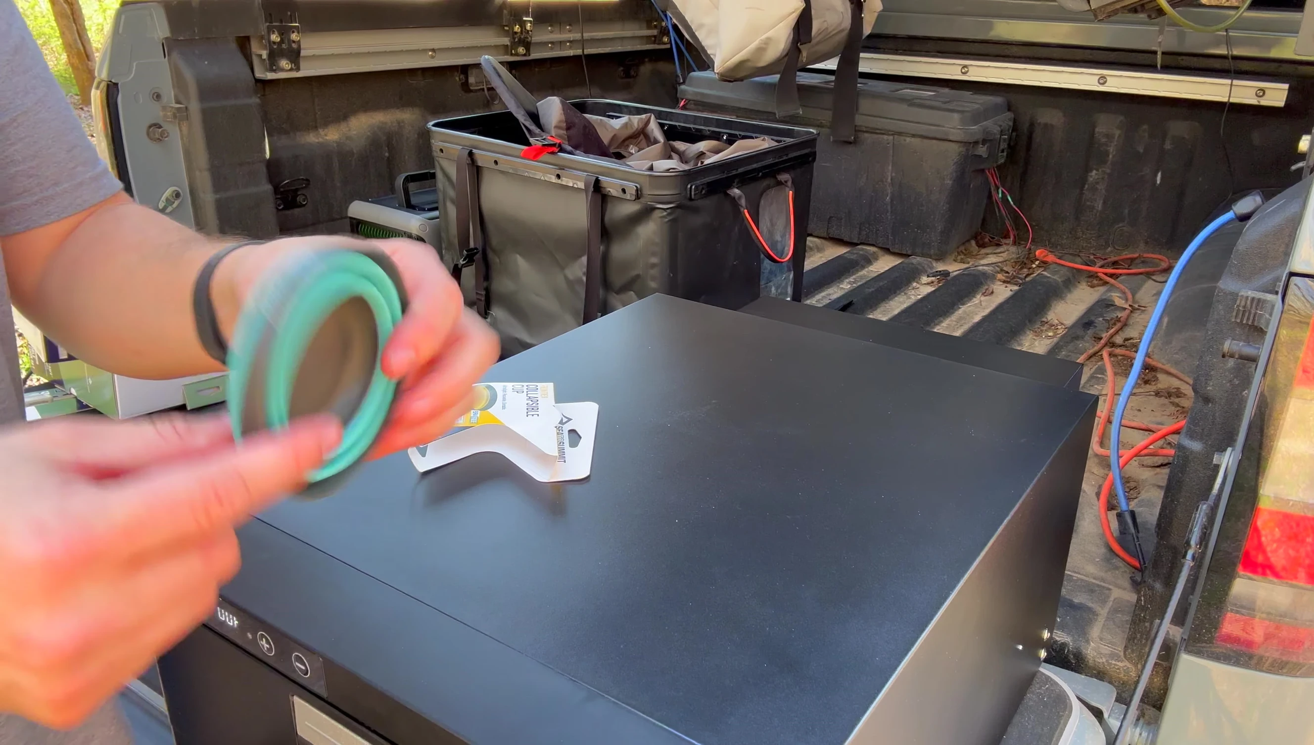 Collapsible cup folded down