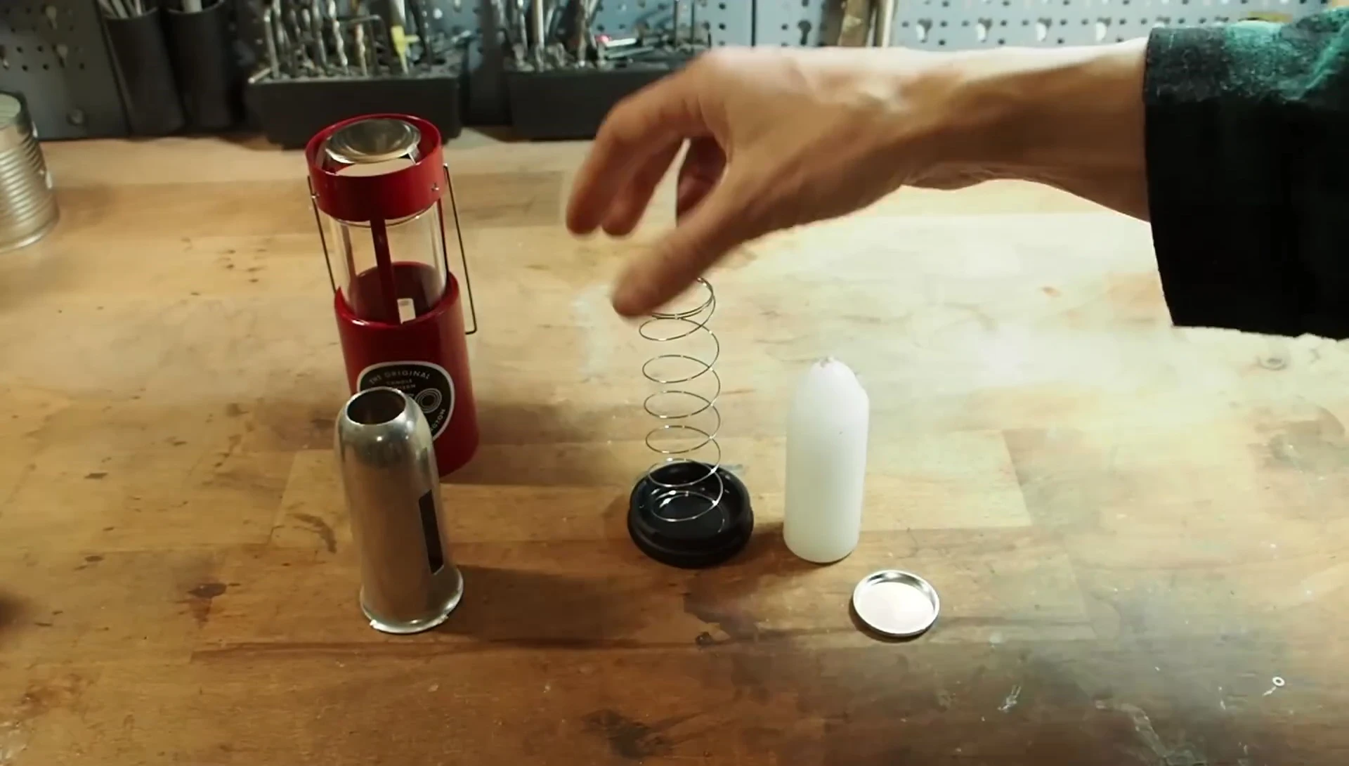 Inside view showing the spring mechanism and candle