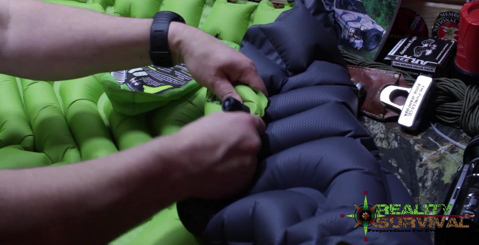 Demonstration of the valve system on the Klymit Static V2 sleeping pad