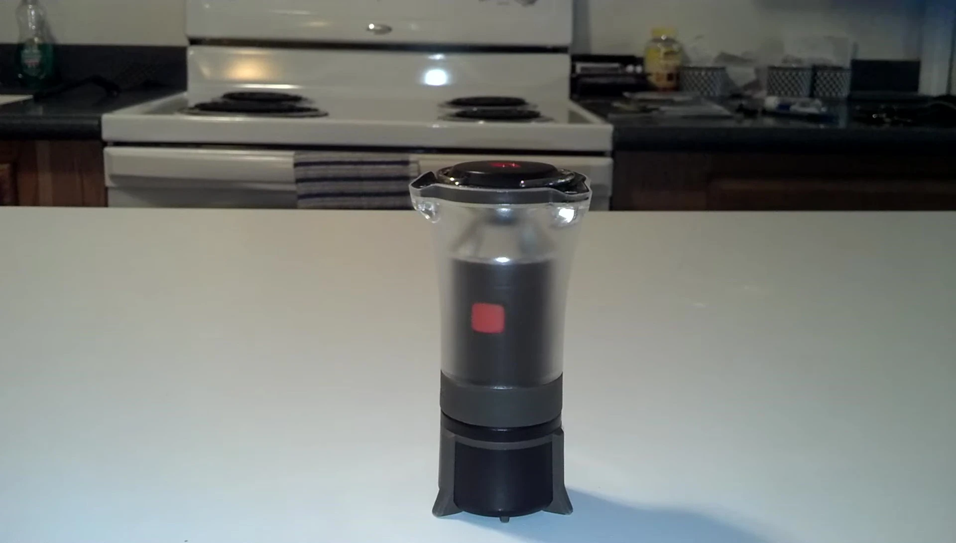 Size comparison between the Black Diamond Orbit and a Nalgene bottle.