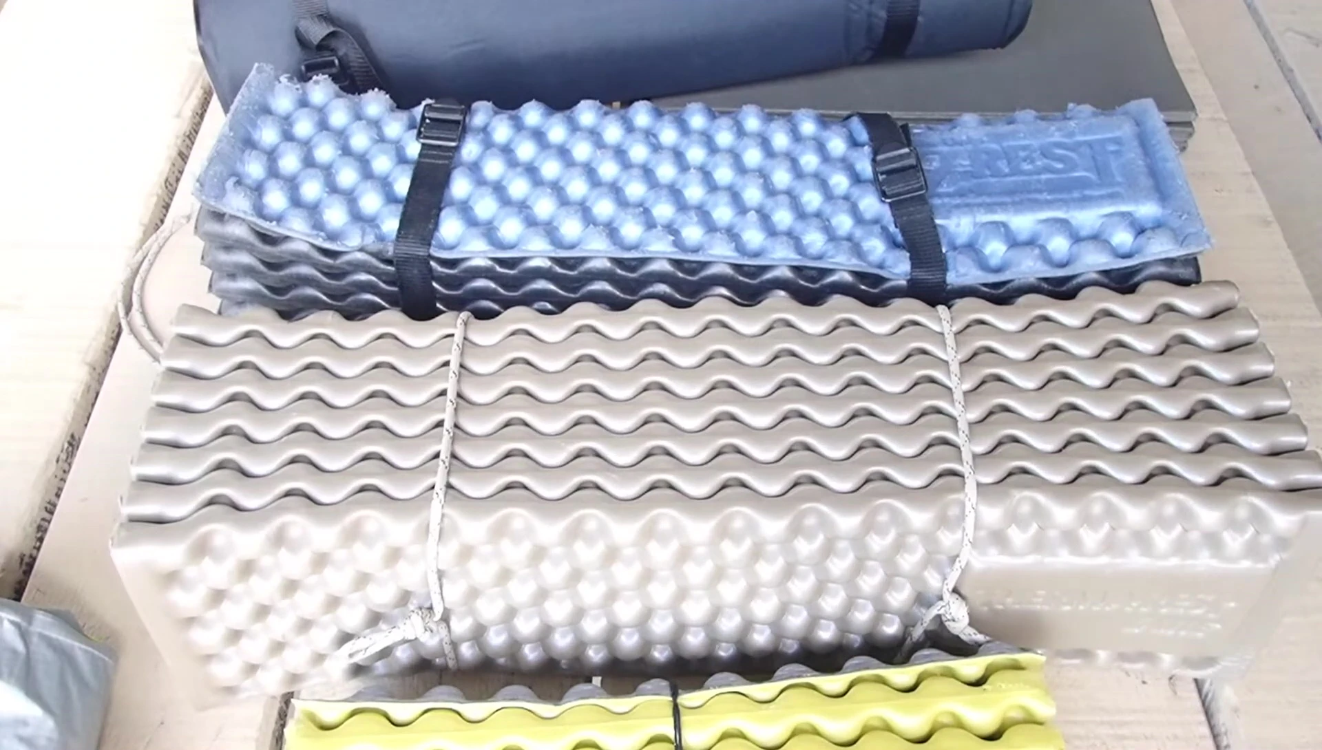 Close-up shot of a basic, thin folding sleeping pad.