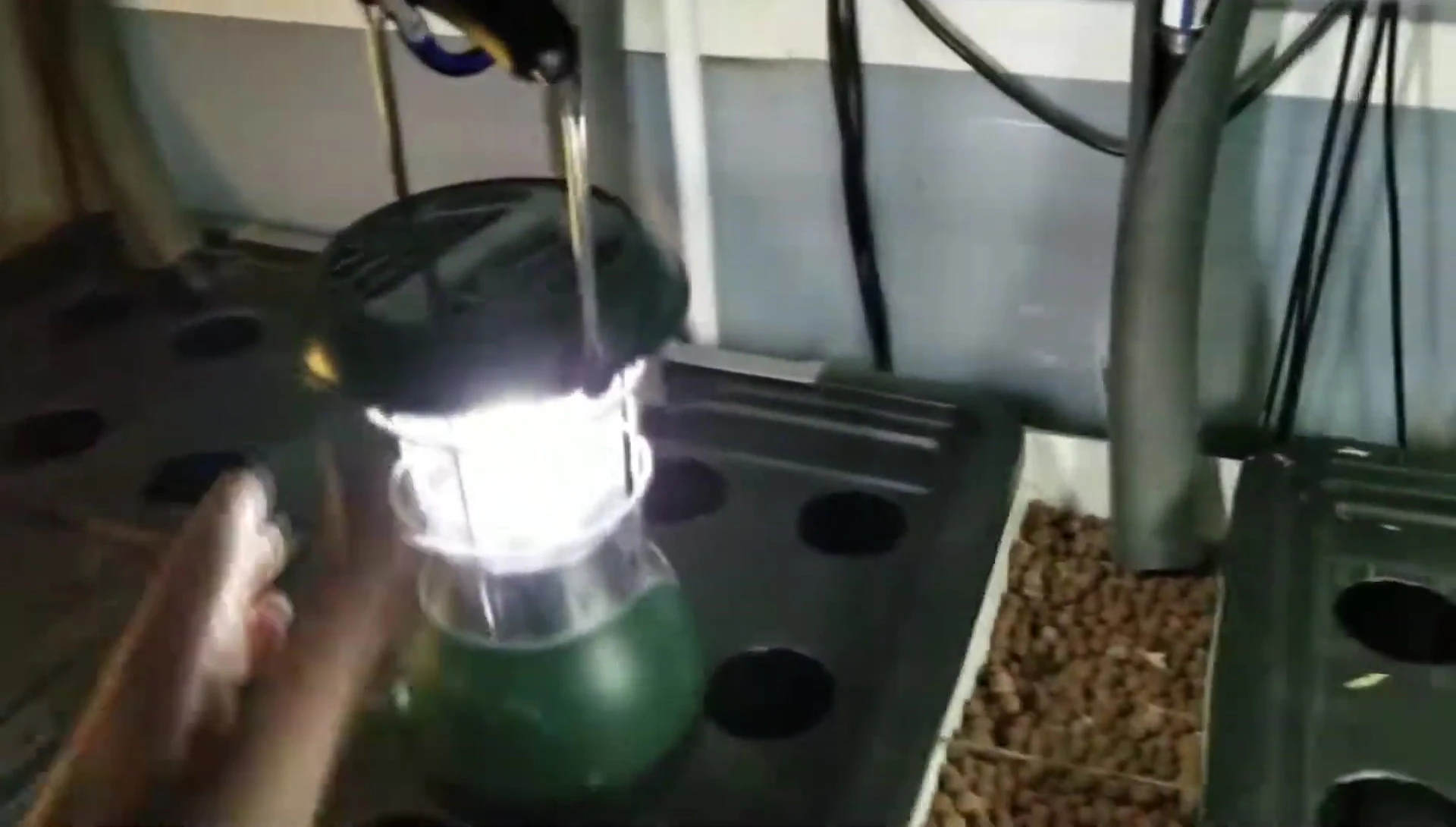Close-up of the Coleman LED lantern with solar panel and hand crank