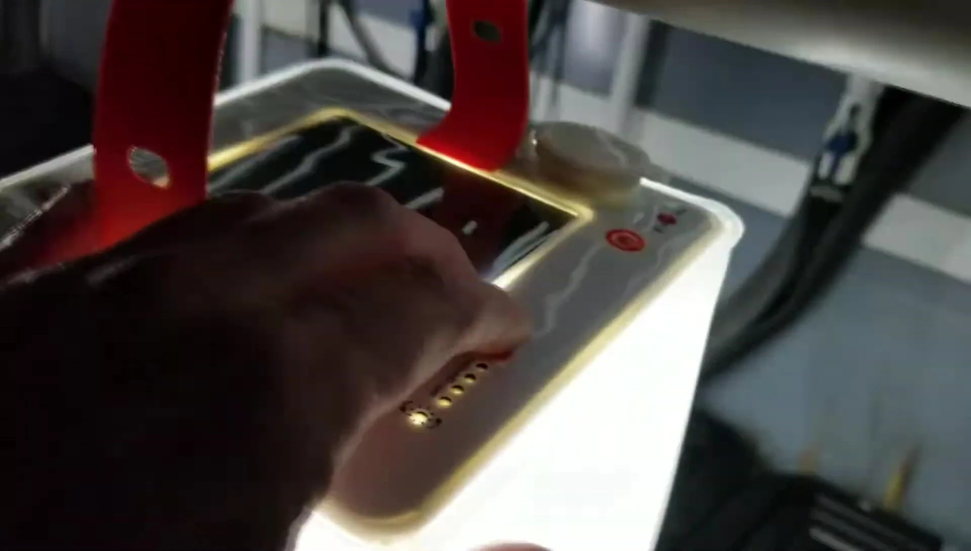 The phone charging port on a LuminAID lantern