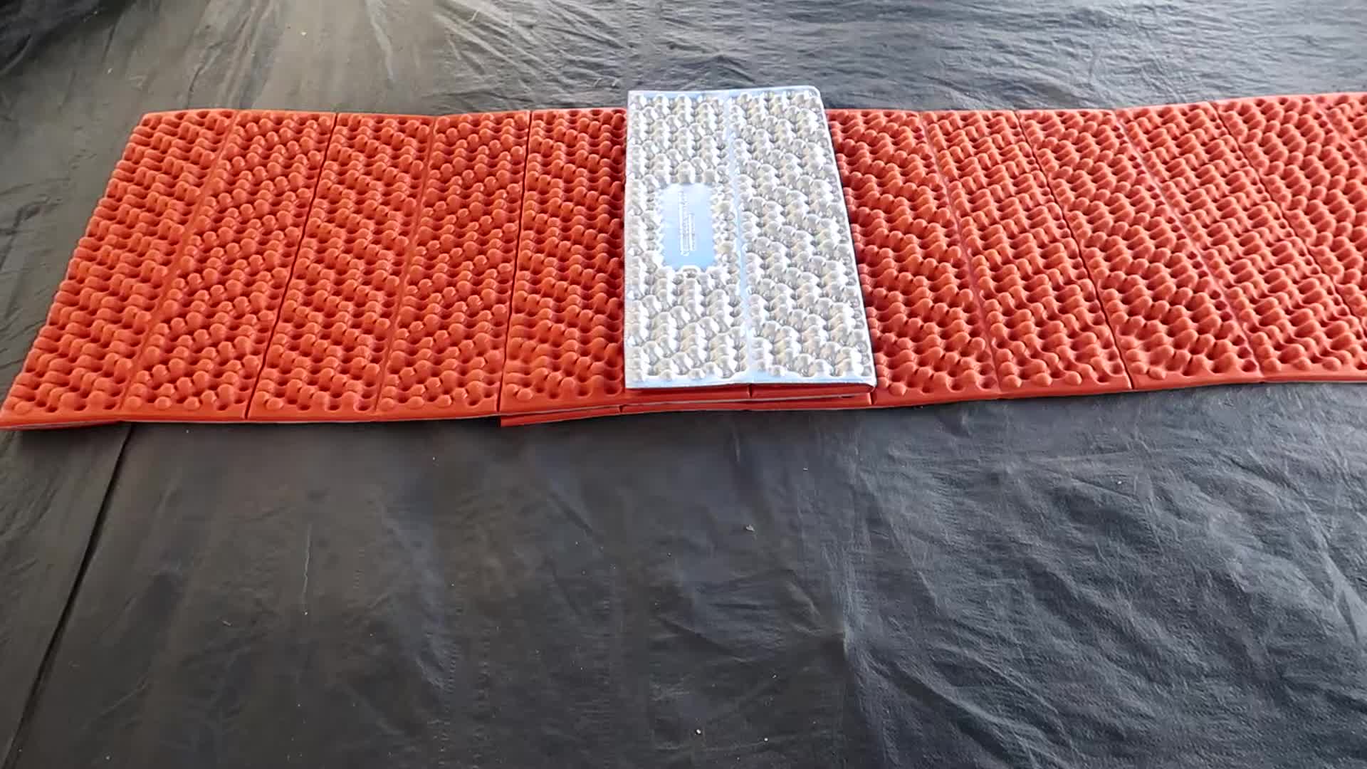 Close-up shot of a deflated air mattress.