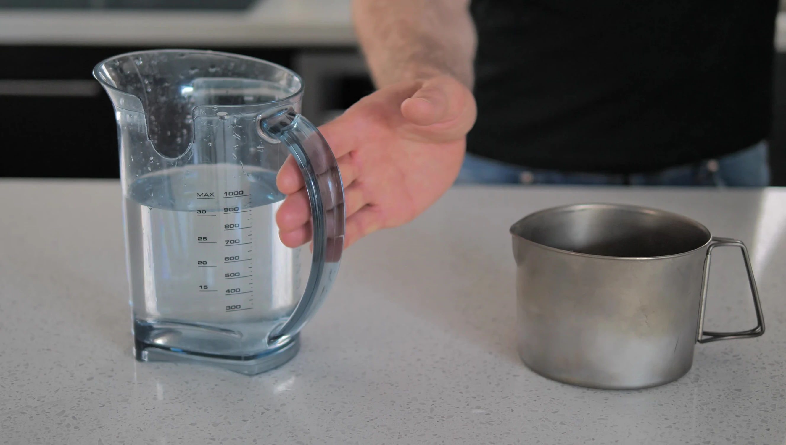 Showing the filling capacity of the MSR Titan Kettle to the brim