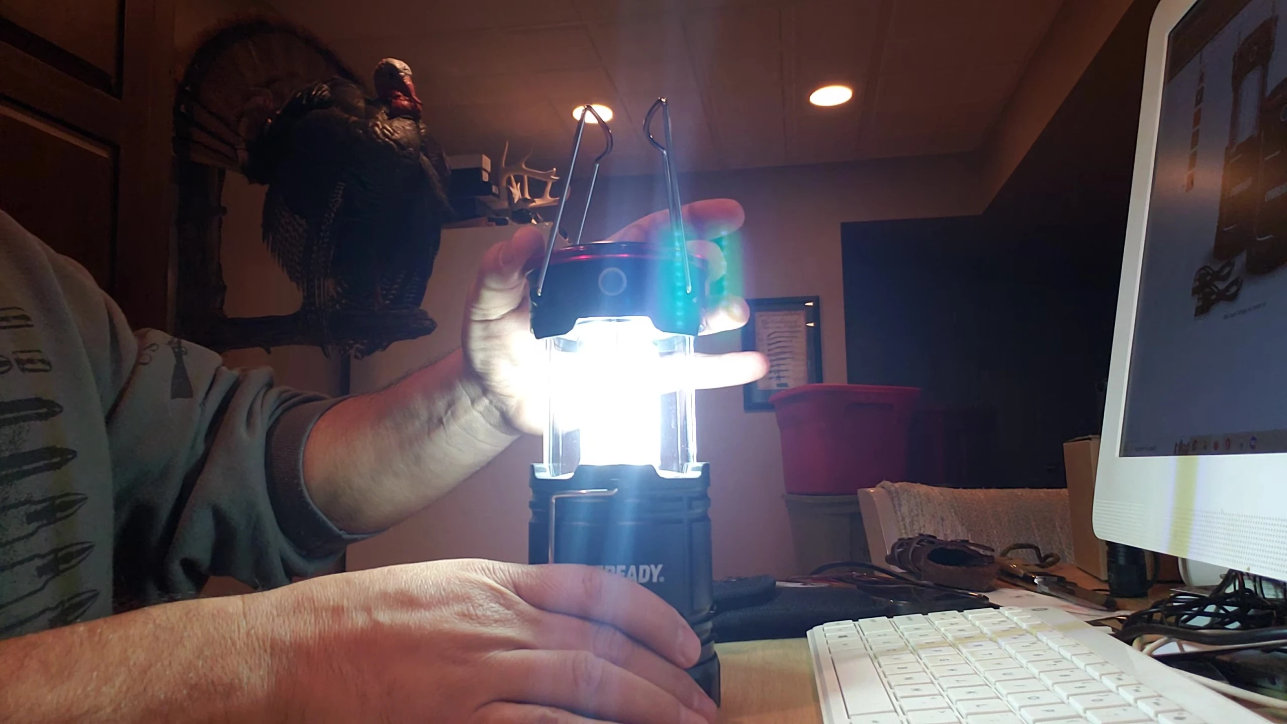 The lantern expanding and turning on automatically.