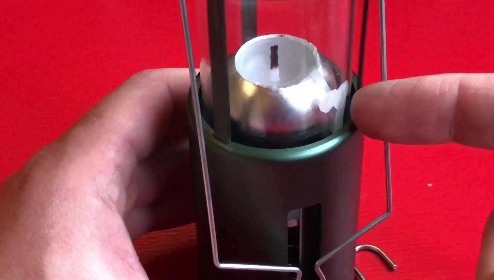 Wax splatter on the lantern, illustrating the need for cleaning.