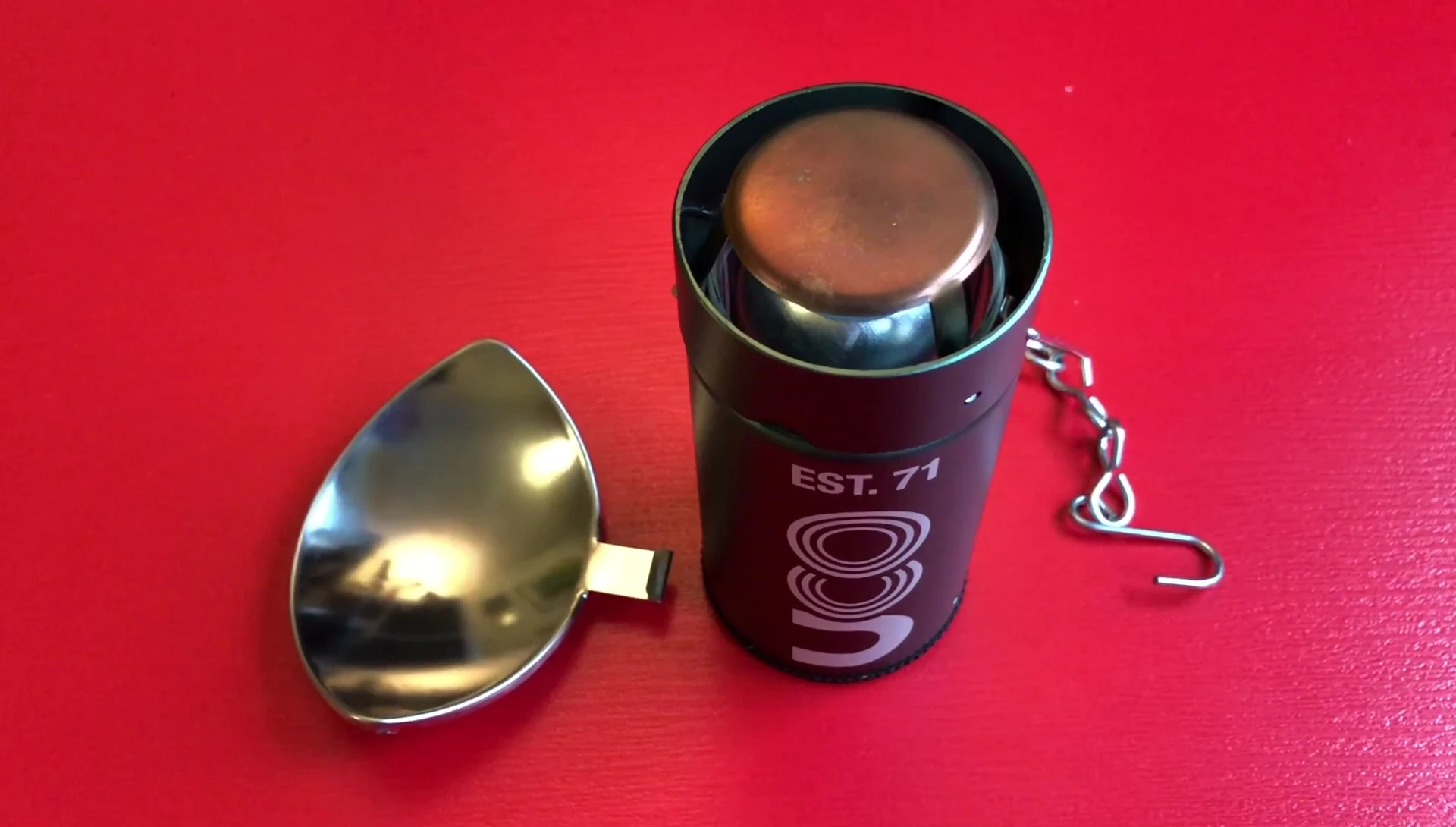 The reviewer shows how the side reflector works.
