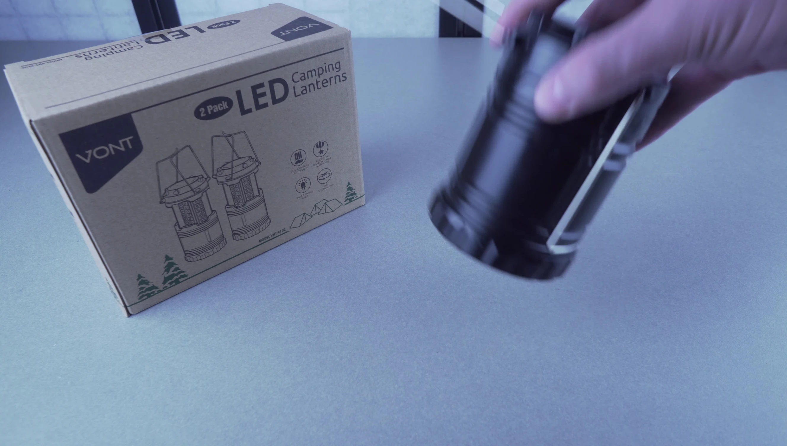 Close-up of a lantern showing the included batteries.