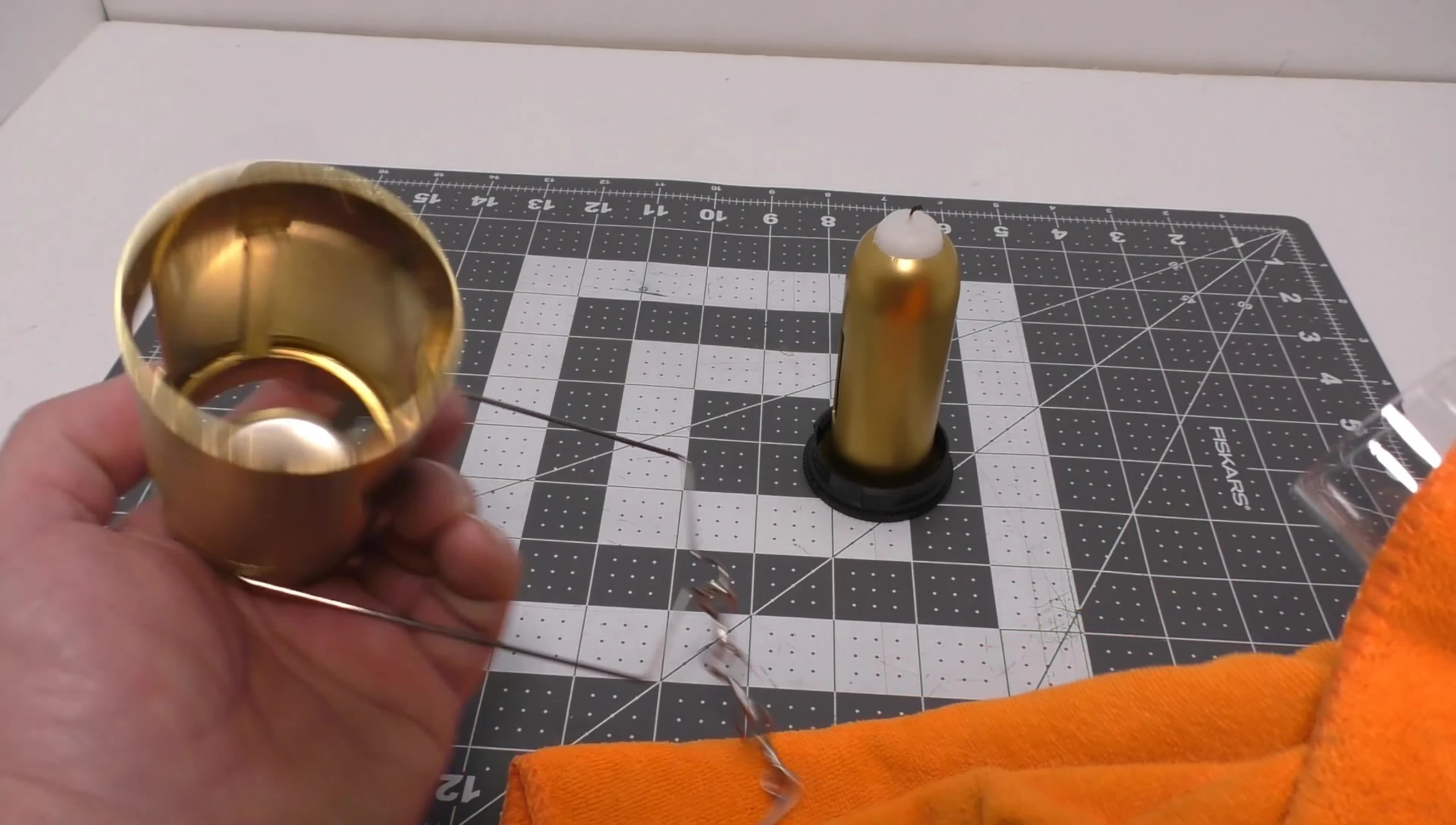 Reassembling the lantern with the clean glass globe.