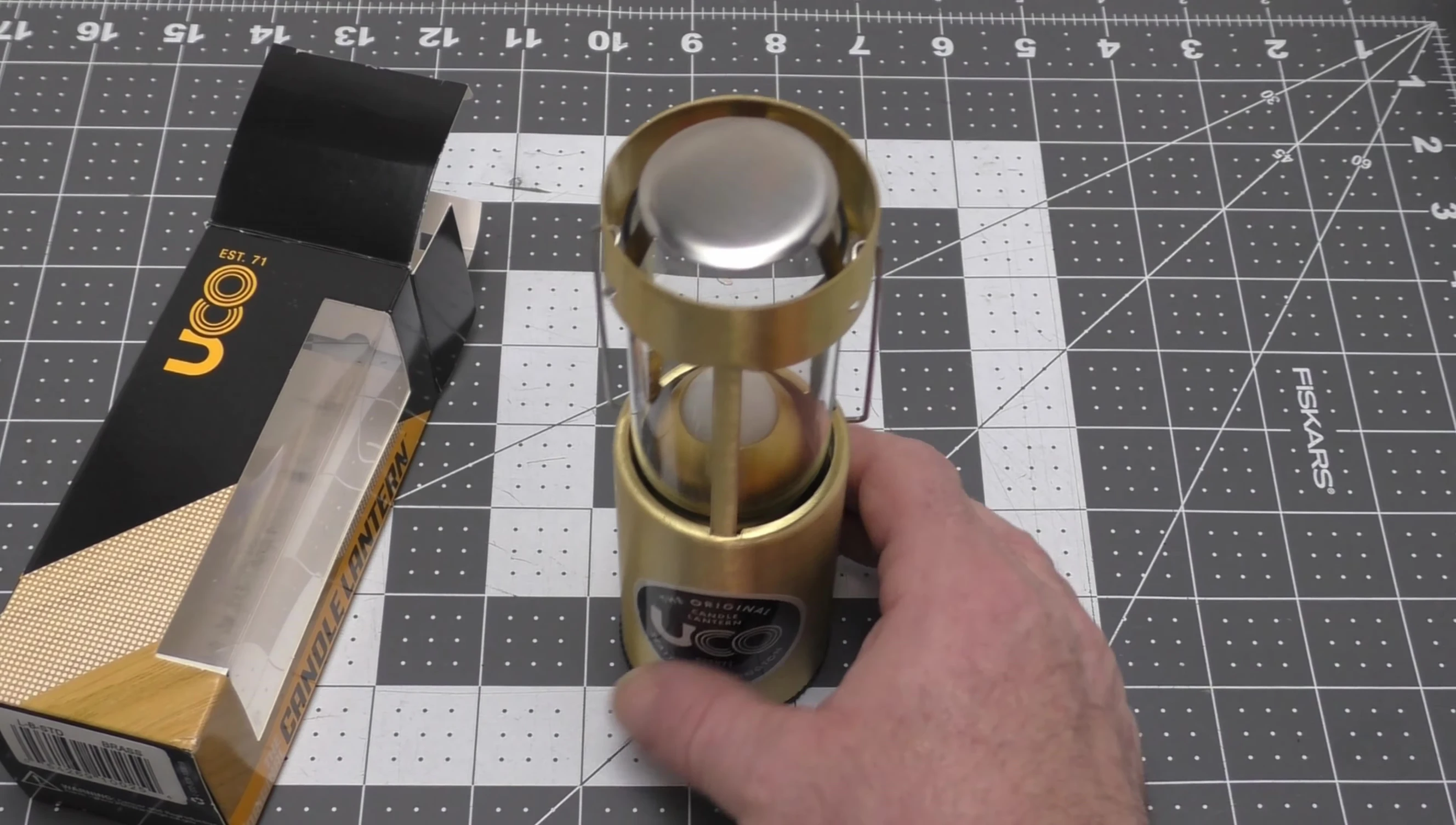 Showing how the base unscrews for candle replacement.