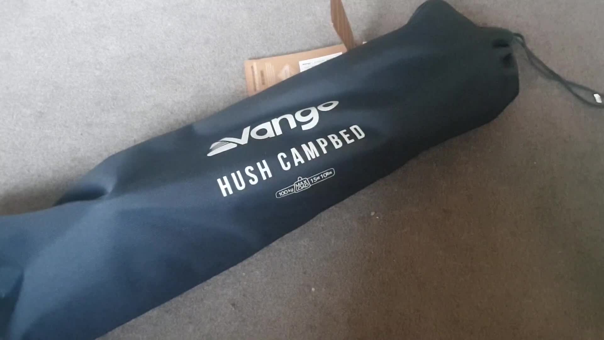 Unpacking the Vango Hush Camp Bed, showing the three main components.