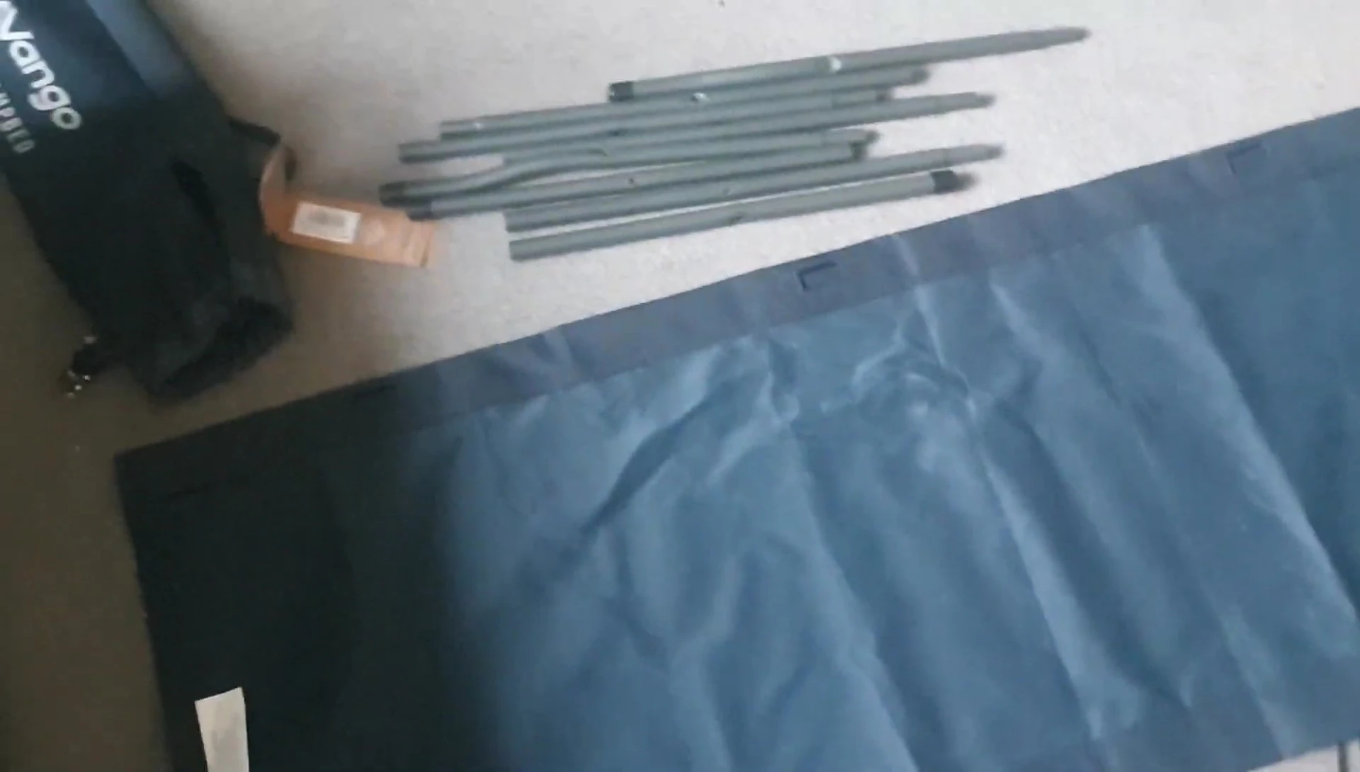 Close-up of the side supports with rubber mounts.