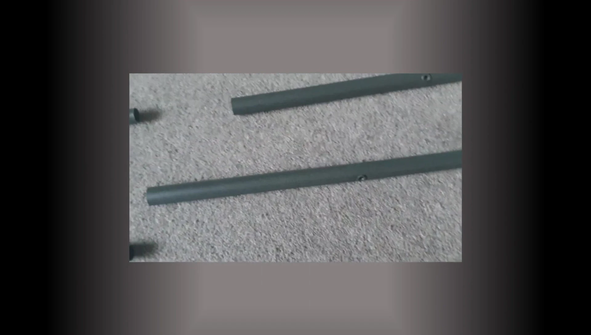 Showing the difference in diameter between the two holes in the side supports.