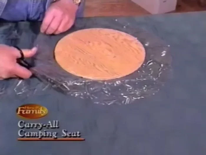 Cut the plastic piece to the exact size of the plywood.