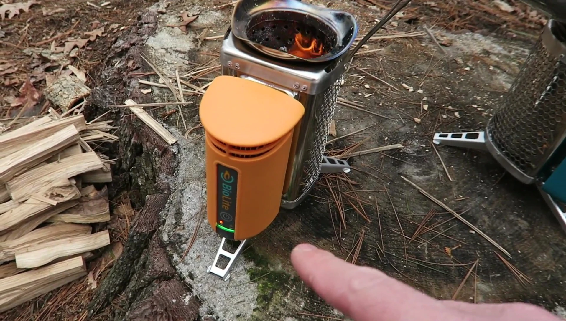 Charging a phone via USB port on the BioLite Camp Stove