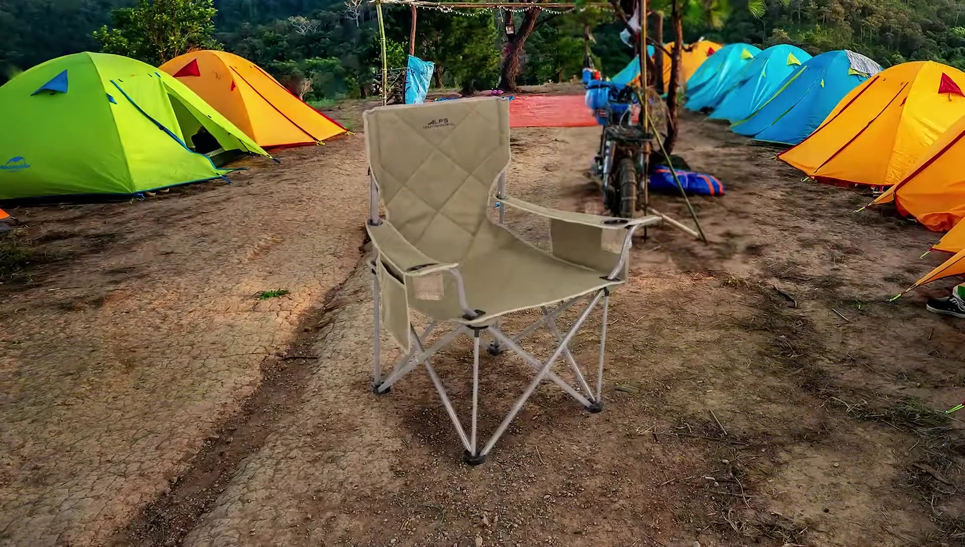 Close-up showing the armrests and cup holder of the Alps Mountaineering King Kong Chair.