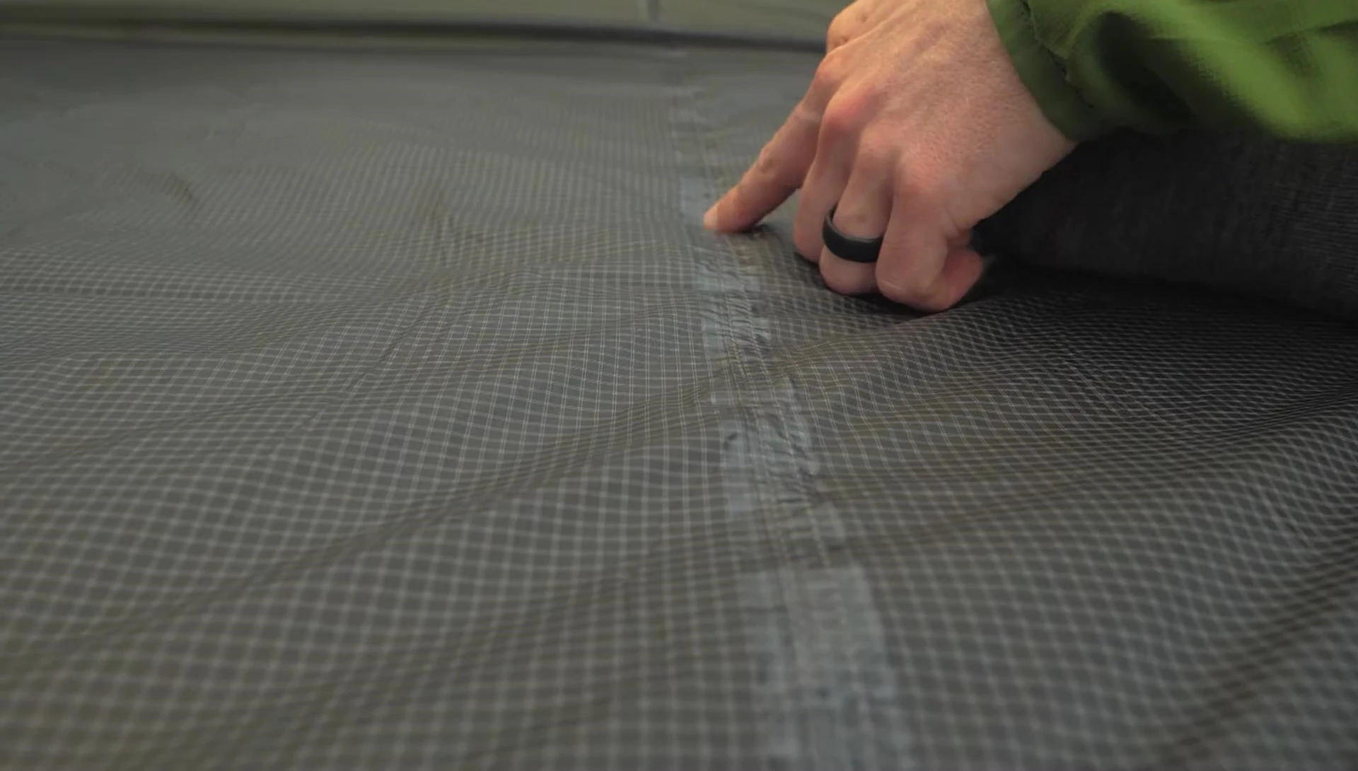 Close-up of the taped seams and bathtub floor.